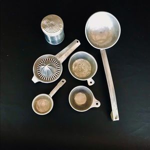 Vintage aluminum kitchen utensils.  Decor.